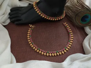 "Classic Beauty: Oval Kemp & Green Stone Anklets with Mango Details"